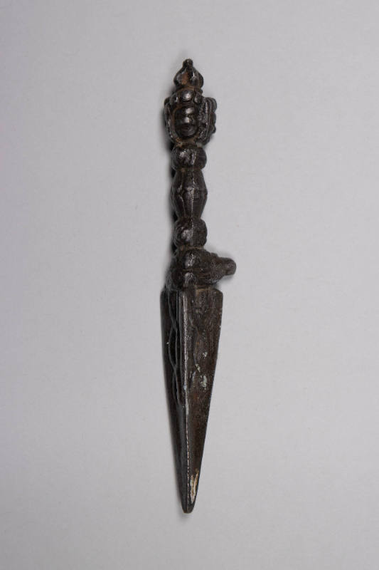 Ritual Dagger (Phurbu), 19th to 20th Century
Tibet Autonomous Region
Brass; 5 3/8 × 1 × 3/4 i…
