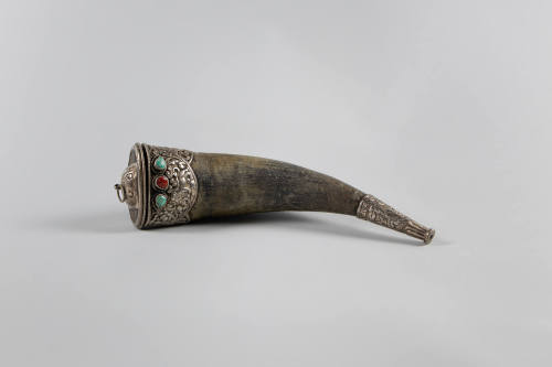 Powder Horn, 19th Century
Tibet Autonomous Region
Horn, silver, turquoise and coral; 10 3/8 ×…