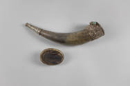 Powder Horn, 19th Century
Tibet Autonomous Region
Horn, silver, turquoise and coral; 10 3/8 ×…