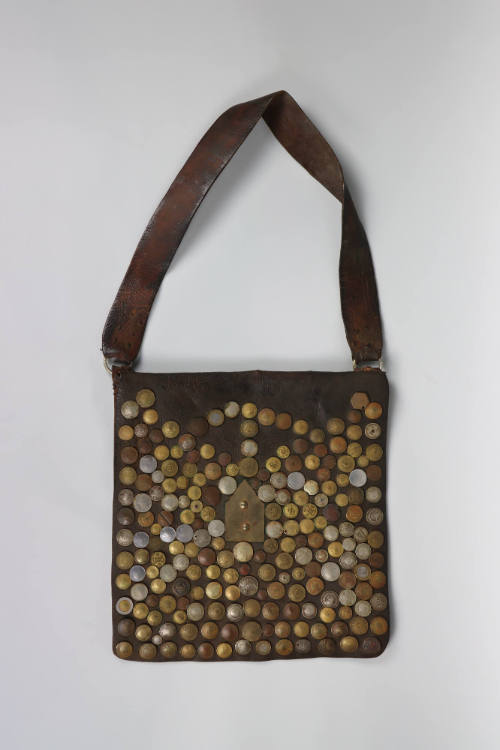 Water Seller's Bag, mid to late 20th Century
Morocco
Leather and metal; 17 1/2 × 17 × 1 1/2 i…