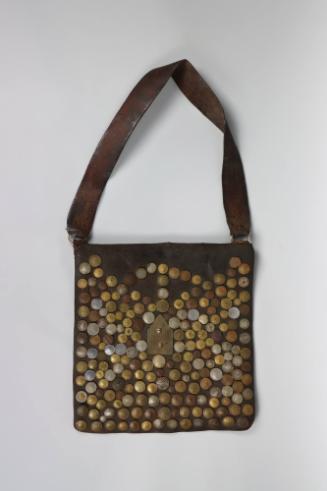 Water Seller's Bag, mid to late 20th Century
Morocco
Leather and metal; 17 1/2 × 17 × 1 1/2 i…