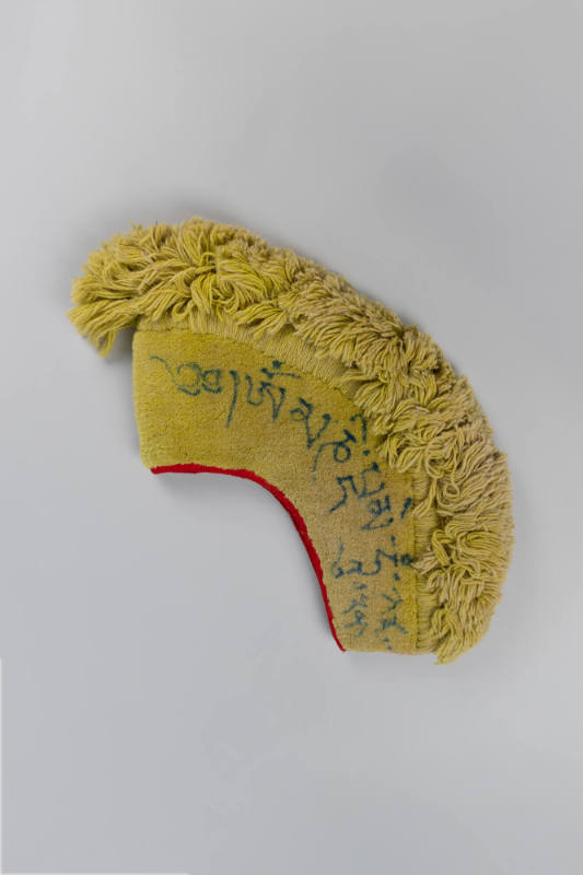 Lama's Headdress, 20th Century
Tibet Autonomous Region
Cotton and dye; 18 3/4 × 3 3/4 × 13 1/…