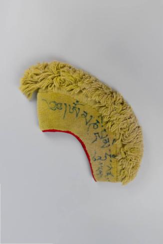Lama's Headdress, 20th Century
Tibet Autonomous Region
Cotton and dye; 18 3/4 × 3 3/4 × 13 1/…