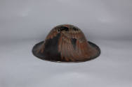 War Hat (Jingasa), late 19th to early 20th century 
Japan 
Wood and lacquer; 4 1/2 × 10 3/4 ×…