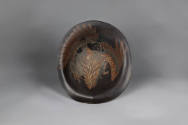 War Hat (Jingasa), late 19th to early 20th century 
Japan 
Wood and lacquer; 4 1/2 × 10 3/4 ×…