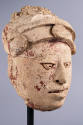 Head of a Noble, 600-900 CE
Maya culture; possibly Uxmal, Yucatán, Mexico
Stucco and pigment;…